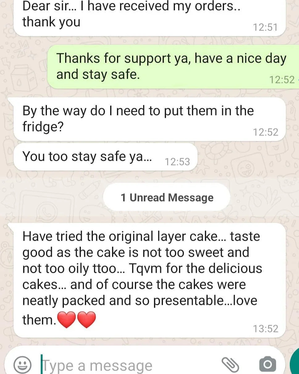 Customer WhatsApp feedback praising original layer cake for taste and neat packaging